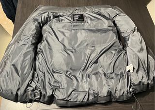 Chaleco acolchado efecto piel gris oscuro