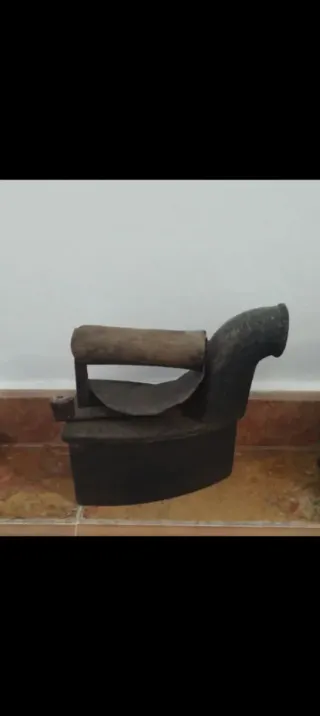 Plancha de carbón antigua