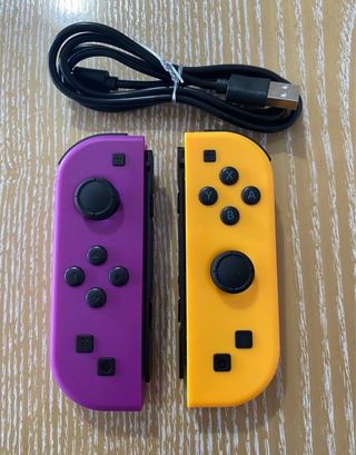 Joycons morado y naranja nintendo switch
