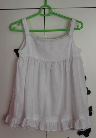 Blusa blanca con volantes Brotes