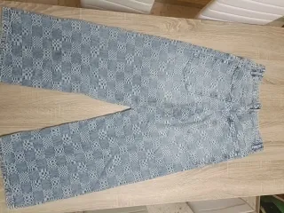 Pantalones vaqueros anchos estampados