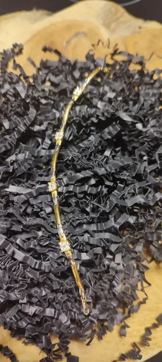 Pulsera de oro bicolor niña circonitas.