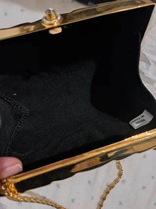 Bolso de mano latón dorado con cadena