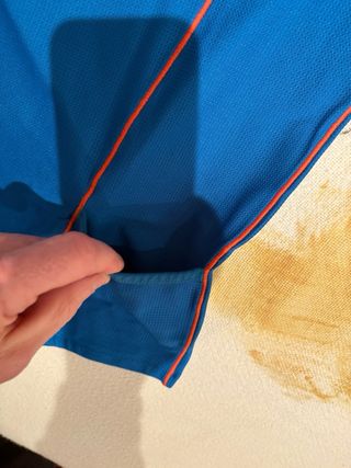 Maillot Zoot azul con cremallera naranja