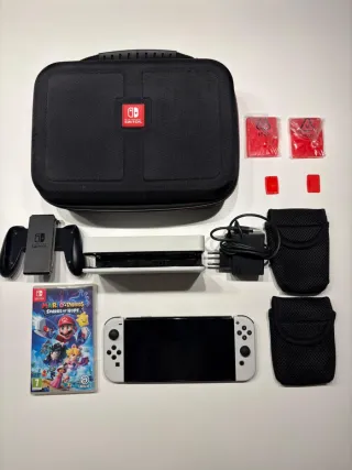Nintendo Switch OLED Bianca + Accessori + gioco