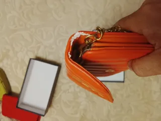 Cartera Yves Saint Laurent Naranja y Dorada