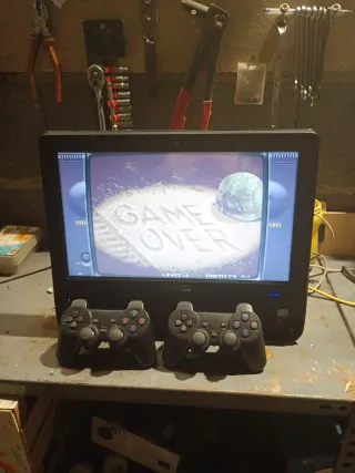 Pc todo en uno con cientos de juegos y con 2 mando