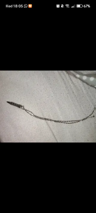 Collana proiettile con teschi argento