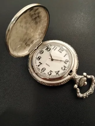 Reloj de bolsillo grabado