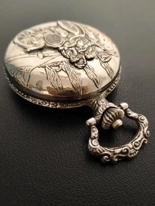 Reloj de bolsillo grabado