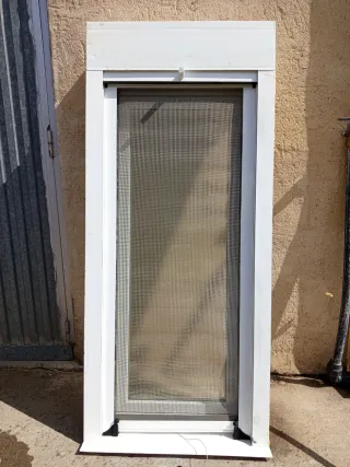 Ventana con mosquitera