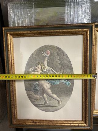 Coppia stampe ovali putti