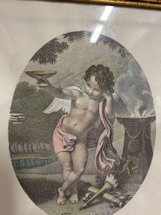 Coppia stampe ovali putti