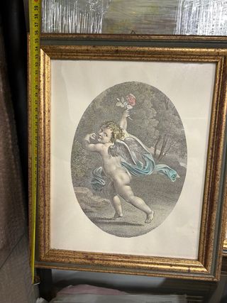 Coppia stampe ovali putti