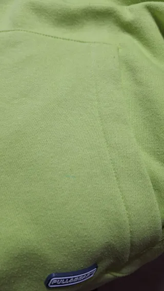 Mancha de bolígrafo en la manga y en el bolsillo