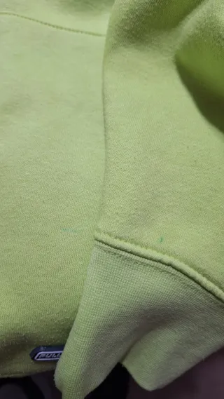 Mancha de bolígrafo en la manga y en el bolsillo