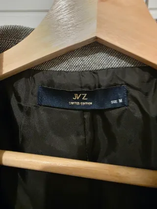 Americana gris hombre