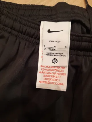 Pantalón chándal Nike gris T. 147-159cm