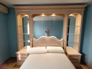 Mueble cabecero con mesitas de noche