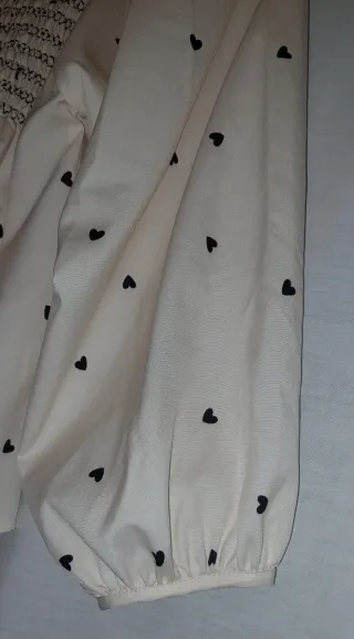 Blusa Nido Abeja estampado Corazones ,Talla S