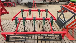 Cultivador 9 brazos y rodillo.