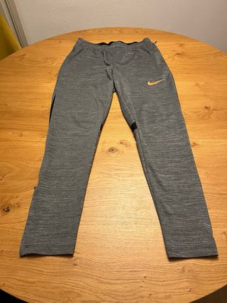 Pantalon chandal Nike gris oscuro. Talla S