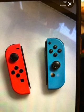 Nintendo Switch Joy-Con Azul y Naranja