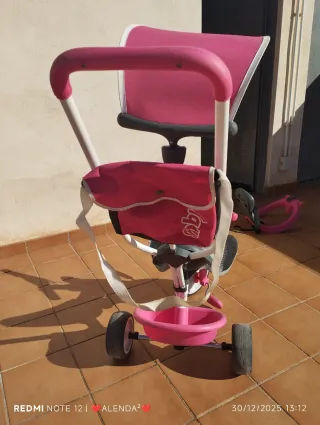 Triciclo infantil rosa y gris