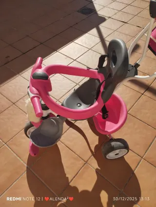 Triciclo infantil rosa y gris