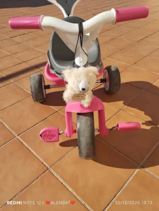 Triciclo infantil rosa y gris