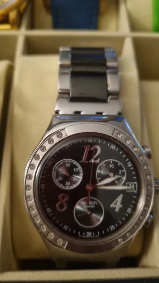 Reloj Swatch Negro y Plateado