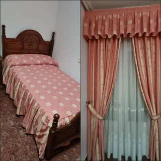 Edredón y cortinas a juego.