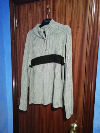 Jersey de punto gris con cremallera