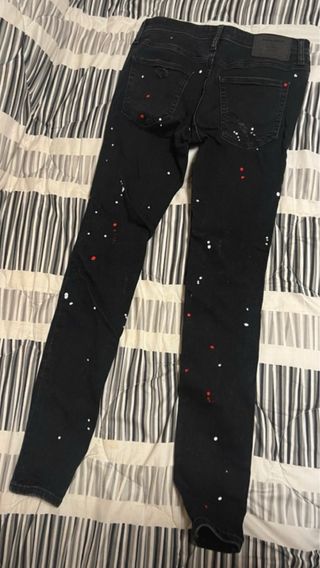 Pantalones vaqueros negros con detalles