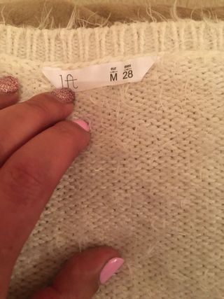 Jersey pelo cuello pico beige/blanco