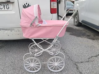 Carrito de bebé rosa