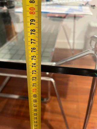 Tavolo in vetro e metallo inox