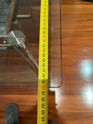 Tavolo in vetro e metallo inox