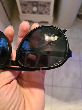 Occhiali da sole Gucci neri e oro