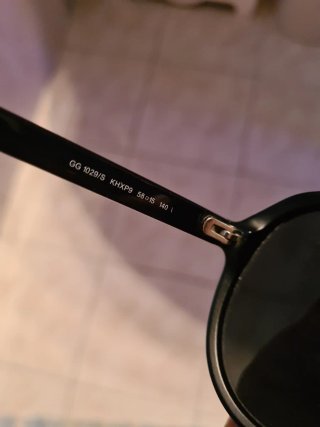 Occhiali da sole Gucci neri e oro