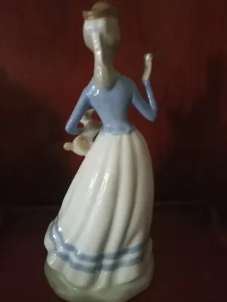 Figura porcelana Mestre 30 CMS altura.