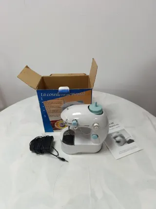 Máquina de coser personal de viaje