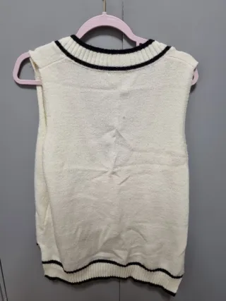 Chaleco de punto sin mangas