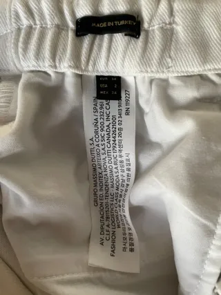 Pantalones Massimo Dutti blancos