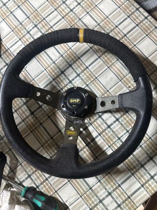 Volante OMP desplazado