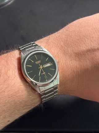 Reloj Orient Quartz Negro y Plateado