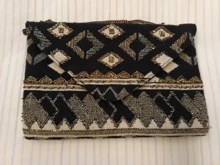 Bolso de fiesta negro y dorado