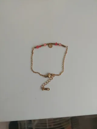 Pulsera de acero con cuentas rosas