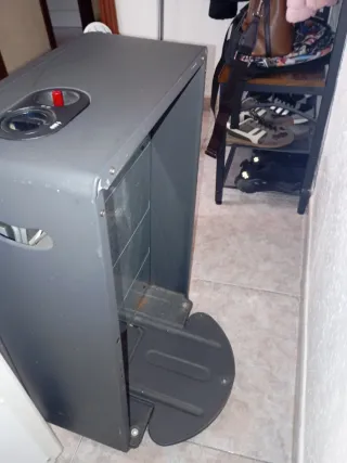 Estufa de gas y radiador eléctrico