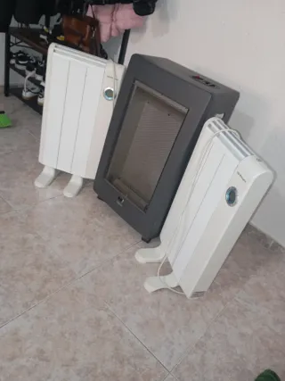Estufa de gas y radiador eléctrico